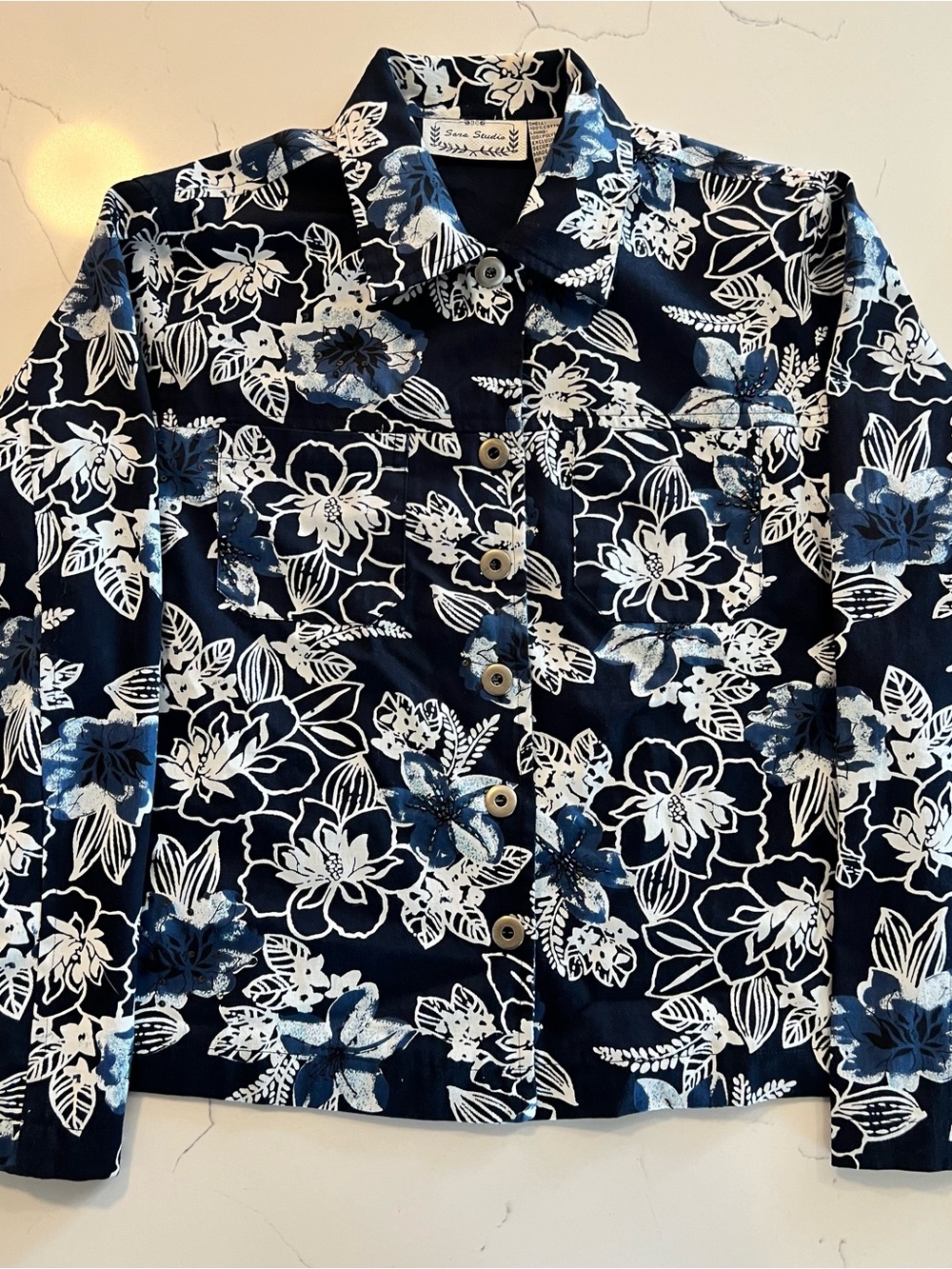 Sara Studio Floral Button-Front Shirt Jacket with beaded detail. Navy & White